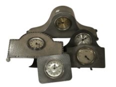 Five various Art Deco pewter mantel clocks.