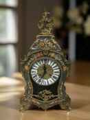 An ornate reproduction gilt metal mounted bracket clock, the movement signed 'FHS, Germany',