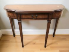 A reproduction mahogany single drawer hall table, width 101 cm, together with a nest of two tables.