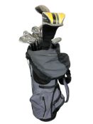 A golf bag containing irons and drivers including McGregor,