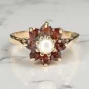 A 9ct gold garnet and pearl cluster ring, size K CONDITION REPORT: 1.