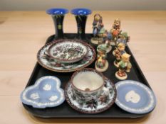 A group of Goebel figures of children, Wedgwood jasperware dishes,