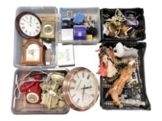 Assorted figurines, modern mantel and wall clocks, telephones, trophies.