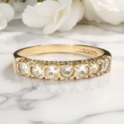 A 9ct gold CZ half eternity ring, size K CONDITION REPORT: 1.