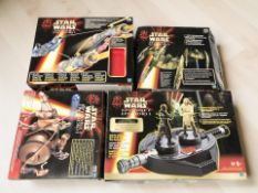 Four Hasbro Star Wars Episode I models including Anakin Skywalker's Pod Racer,