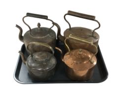 Four various Victorian copper kettles.