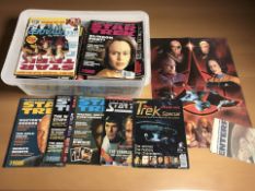 A collection of Star Trek magazines.