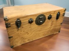 An early 20th century camphor wood and brass bound blanket chest, 97 cm x 55 cm x 51 cm.