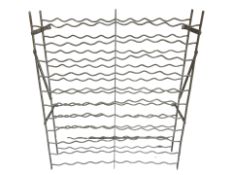 A galvanised metal bottle rack,