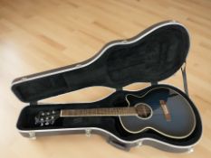 A Jacky Jackson electro acoustic guitar, numbered DRW-9712EQ/BLS, in a takamine hard carry case.