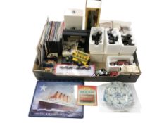 A group of boxed and unboxed die cast cars including Oxford, DVDs relating to military vehicles,