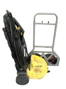 A Karcher 300 pressure washer and a Clarke folding sack barrow