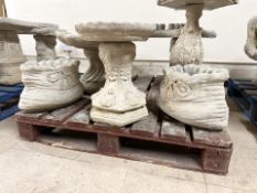 A pair of concrete sack planters, height 24 cm.