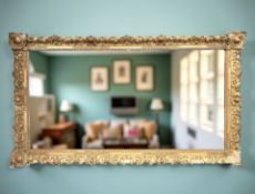 A 19th century French gilt wood and gesso overmantel mirror,