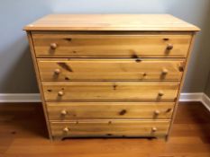 A modern pine five drawer chest, 96 cm x 52 cm x 91 cm.