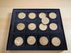 A small group of commemorative crowns.