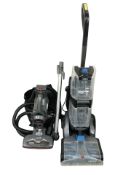 A Beldray vacuum cleaner and a Vax carpet cleaner.