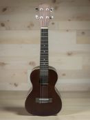 An Arcade 1908 ukulele by J.