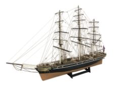A wooden hand built scale model of the Cutty Sark, length 113 cm.