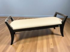 A contemporary window seat, width 145 cm.