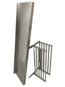 Two Ikea metal wall racks and a further stainless steel shelf