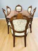 An Italian style high gloss shaped top dining table and a set of six chairs,