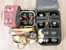Several cases of lawn bowls including Henselite.