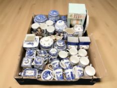 A collection of Ringtons caddies, vases, mugs, ginger jars, etc.