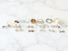 A group of mainly silver-mounted jewellery including earrings, pendants,