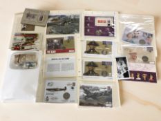 A group of Royal Mail mint stamps, coin covers, albums of Wills and Brooke Bond cigarette cards,