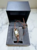 A lady's gold-plated Gucci quartz wristwatch, case 13mm, boxed.