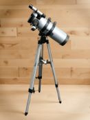 A Far Vision telescope on tripod.