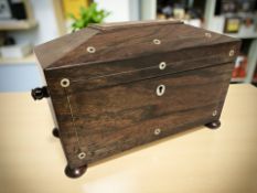 A Regency rosewood and mother of pearl inlaid two division tea caddy, width 32 cm.