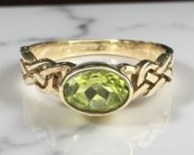 A 9ct gold peridot ring, size N CONDITION REPORT: 2.