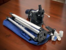 A Meade electronic telescope with tripod, carry bag and accessories.