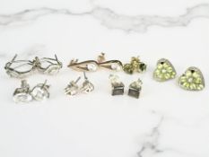 Several pairs of silver gem set earrings including green tourmaline,