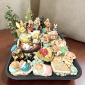 A group of Pendelfin rabbits.