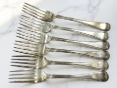 Six George III silver table forks, London 1814. CONDITION REPORT: 370.