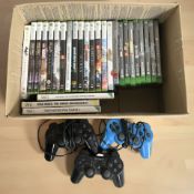 A quantity of Xbox and Nintendo video games, three controllers.