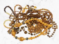 A group of baltic amber and further necklaces (Q)