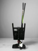 A Dunlop golf driver plus two other clubs.