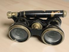 A pair of early 20th century brass and faux tortoise shell opera glasses.