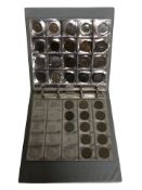 An album of British coins containing assorted crowns, pre-decimal, etc.