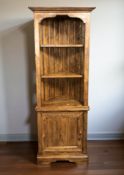 A Willis & Gambier pine corner cabinet, height 195 cm.