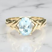 A 9ct gold blue topaz solitaire ring, size O CONDITION REPORT: 3.