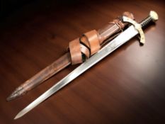 A copy of a medieval one-handed sword, with 85 cm double edged tapering blade,