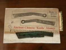 An ancient Chinese bronze currency token in the form of a knife blade circa 400-250 B.