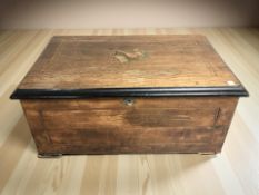 A 19th century rosewood and satinwood inlaid cylinder music box playing eight airs, width 48 cm.