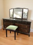 A Stag eight drawer mirror back dressing chest, 156 cm x 48 cm x 127 cm,