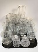 A group of etched drinking glasses, crystal tankard and jugs, preserve pots.